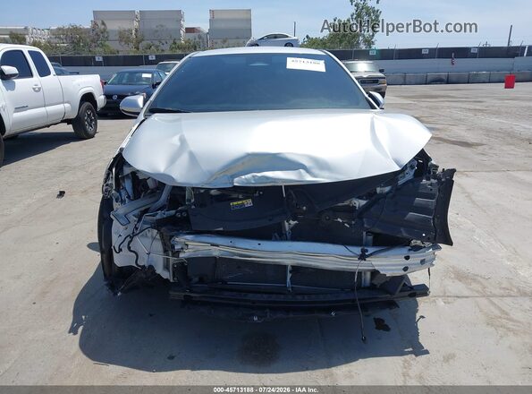 5YFS4MCE4SP234811 2025 TOYOTA COROLLA Silver Սալոնի հետևի տեսք