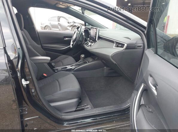 5YFS4MCE5MP085893 2021 TOYOTA COROLLA Black წინა სალონის ხედი