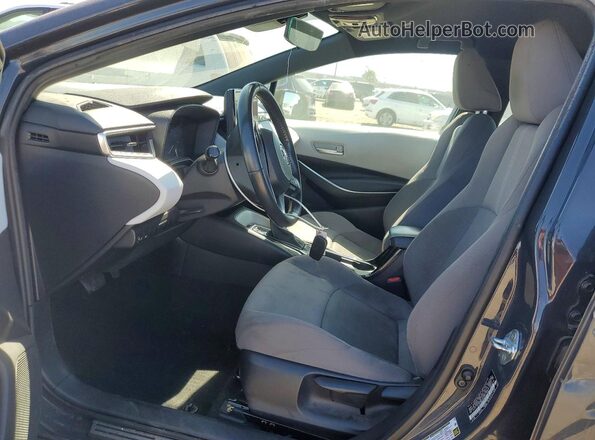 5YFS4MCE6PP143448 2023 TOYOTA COROLLA Gray Vista interior delantera