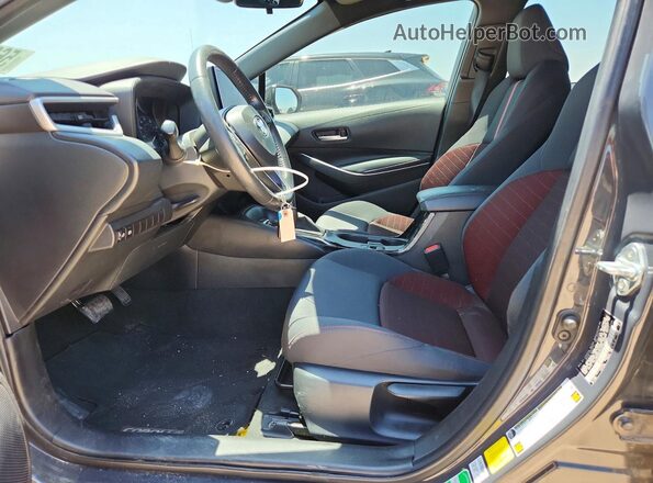 5YFS4MCE6PP148021 2023 TOYOTA COROLLA Угольный Вид салона спереди