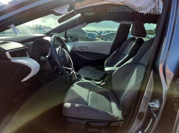 5YFS4MCE8SP232933 2025 TOYOTA COROLLA Gray Vista interior delantera