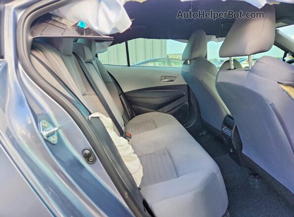 5YFS4MCE8SP232933 2025 TOYOTA COROLLA Gray Vista de los asientos traseros