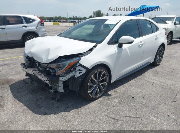 5YFS4MCE9MP061287 2021 TOYOTA COROLLA White Vista tres cuartos delantera izquierda
