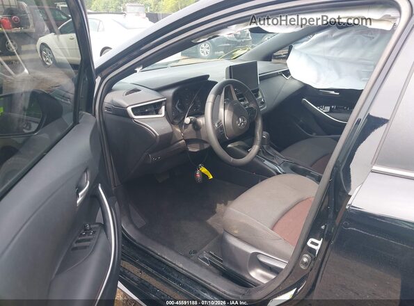 5YFS4MCE9SP233119 2025 TOYOTA COROLLA Черный Вид салона спереди