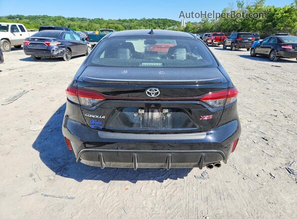 5YFT4MCE6RP204451 2024 TOYOTA COROLLA Charcoal Widok z tyłu