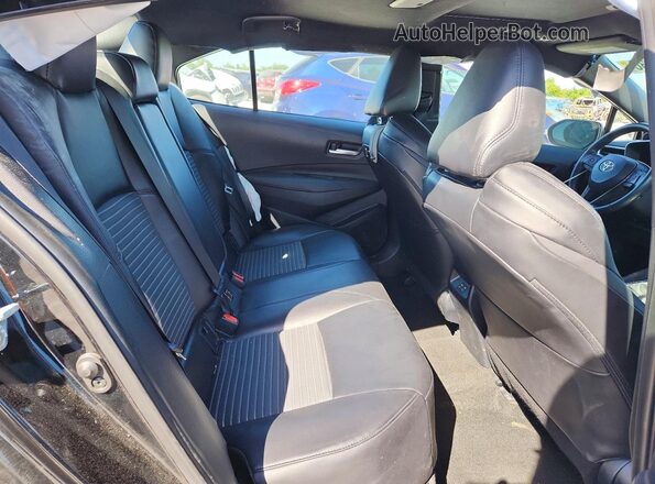 5YFT4MCE6RP204451 2024 TOYOTA COROLLA Charcoal Widok tylnych siedzeń