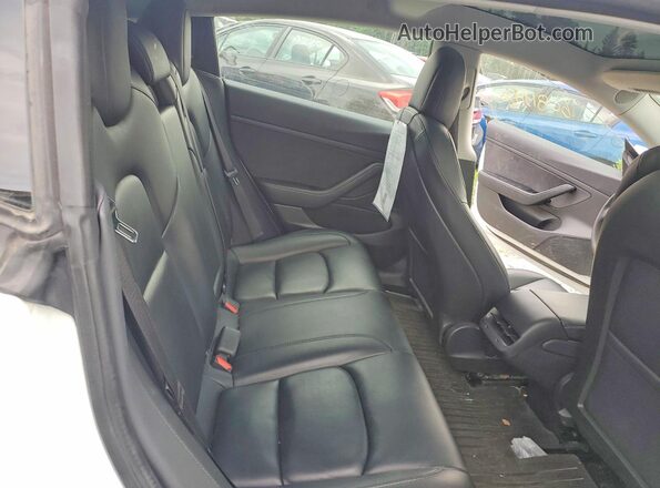 5YJ3E1EA0LF529332 2020 TESLA MODEL White Rear seats view