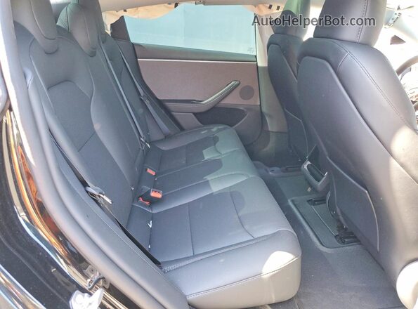 5YJ3E1EA0SF069748 2025 TESLA MODEL Black Widok tylnych siedzeń