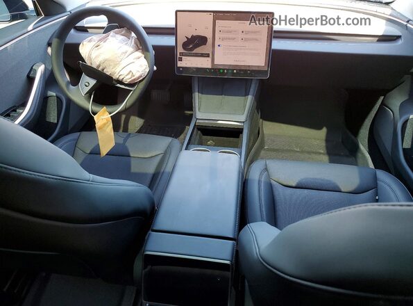 5YJ3E1EA0SF069748 2025 TESLA MODEL Black Widok deski rozdzielczej