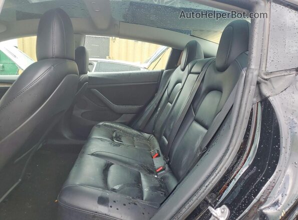 5YJ3E1EA1NF369643 2022 TESLA MODEL Black Rear seats view