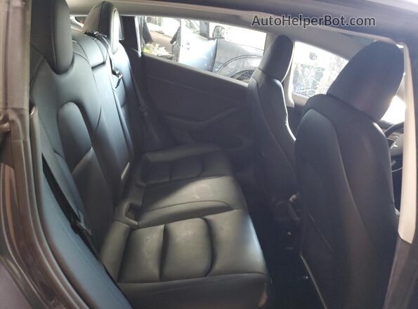 5YJ3E1EA1PF658573 2023 TESLA MODEL Charcoal Հետևի նստատեղերի տեսք