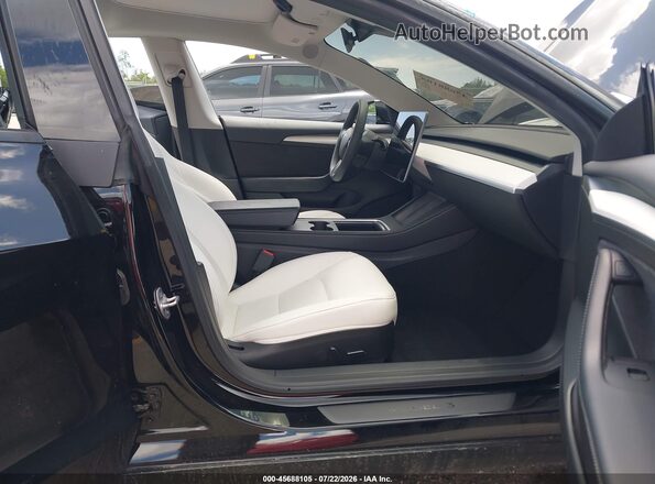 5YJ3E1EA4PF625244 2023 TESLA MODEL 3 Черный Вид салона спереди