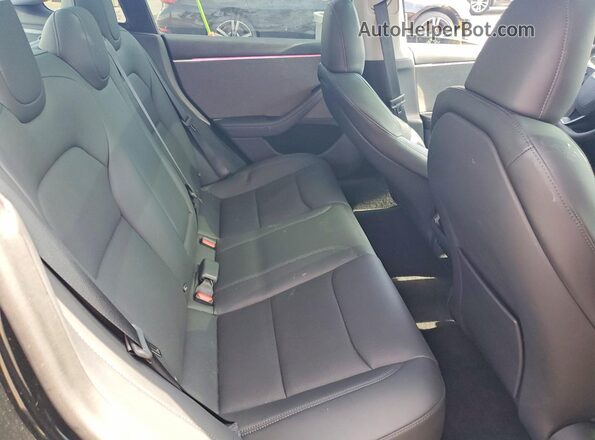 5YJ3E1EA4RF762722 2024 TESLA MODEL Black Rear seats view
