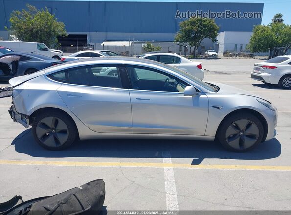 5YJ3E1EA5JF030653 2018 TESLA MODEL 3 Silver Vista interior trasera