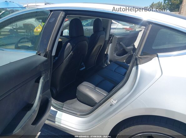 5YJ3E1EA5JF030653 2018 TESLA MODEL 3 Silver Vista de la etiqueta del VIN
