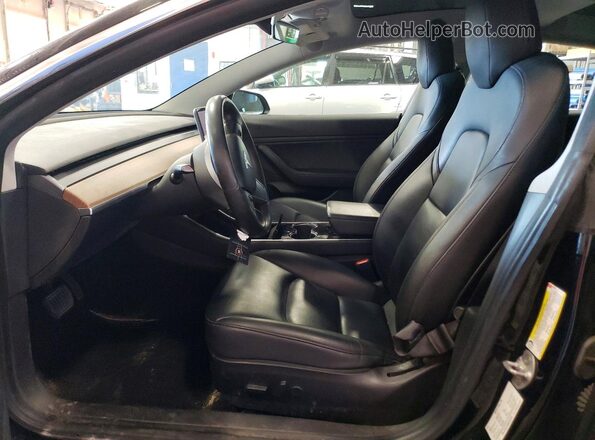 5YJ3E1EA6KF297916 2019 TESLA MODEL Black Front interior view