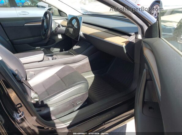 5YJ3E1EA9PF454345 2023 TESLA MODEL 3 Черный Вид салона спереди