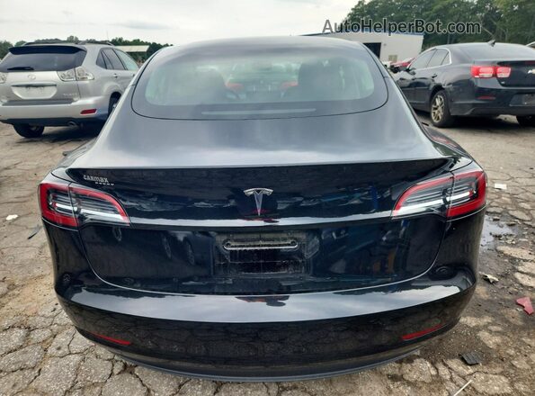 5YJ3E1EA9PF668011 2023 TESLA MODEL Черный Вид сзади