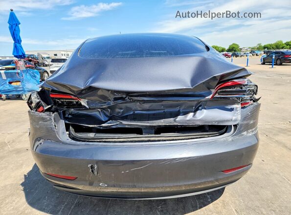 5YJ3E1EA9PF672074 2023 TESLA MODEL Gray Vista trasera