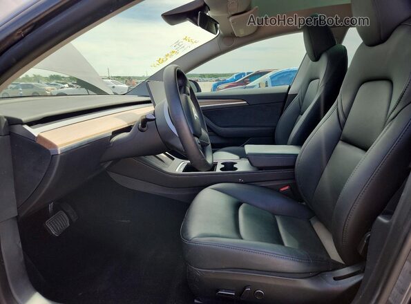 5YJ3E1EA9PF672074 2023 TESLA MODEL Gray Vista interior delantera