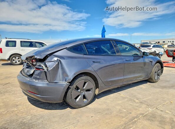 5YJ3E1EA9PF672074 2023 TESLA MODEL Gray Trasero derecho