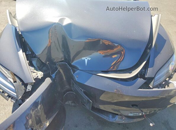 5YJ3E1EA9SF001691 2025 TESLA MODEL Charcoal Widok wnętrza z tyłu