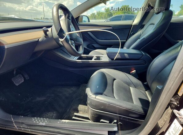 5YJ3E1EAXPF452832 2023 TESLA MODEL Черный Вид салона спереди