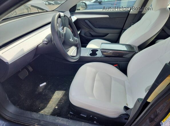 5YJ3E1EAXPF641027 2023 TESLA MODEL Charcoal Vista interior delantera