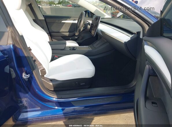 5YJ3E1EAXPF669703 2023 TESLA MODEL 3 Blue Widok wnętrza z przodu