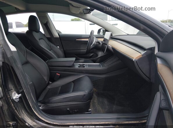 5YJ3E1EB0PF615416 2023 TESLA MODEL 3 Black Widok wnętrza z przodu