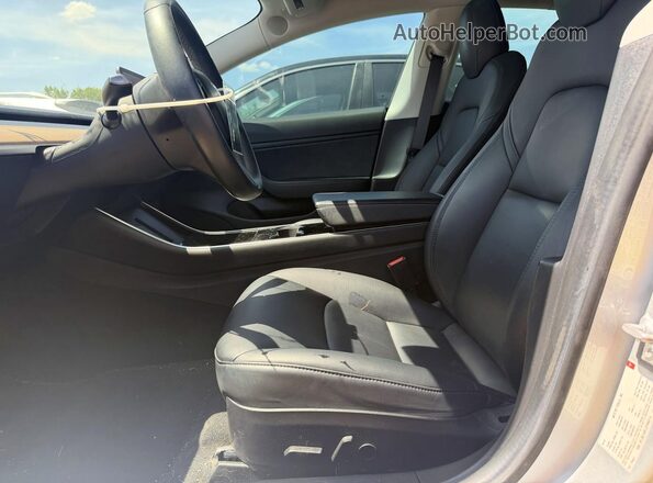 5YJ3E1EB1JF094214 2018 TESLA MODEL Silver Front interior view