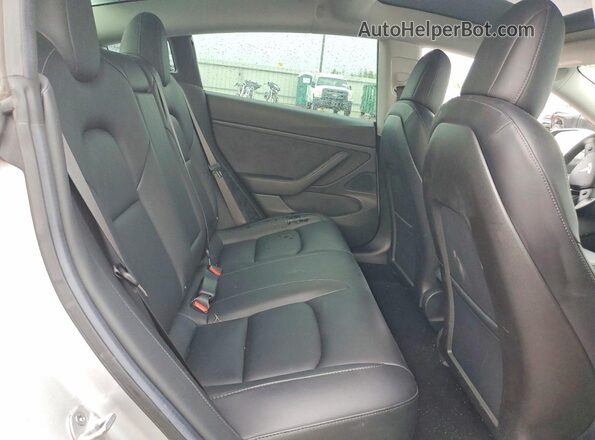 5YJ3E1EB1JF094214 2018 TESLA MODEL Silver Rear seats view