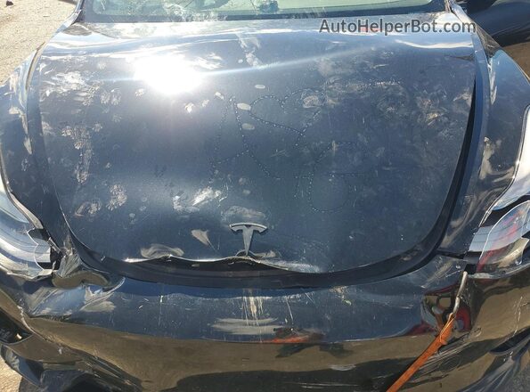 5YJ3E1EB1MF052940 2021 TESLA MODEL Black Vista interior trasera