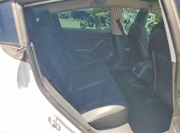5YJ3E1EB1MF077921 2021 TESLA MODEL White Vista de los asientos traseros