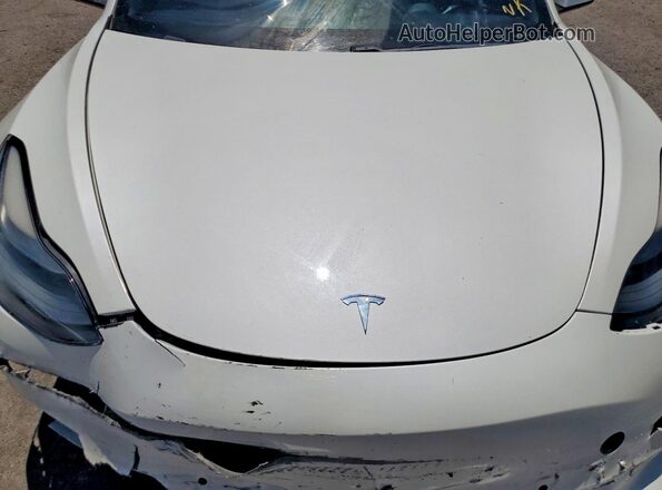 5YJ3E1EB1MF077921 2021 TESLA MODEL White Vista interior trasera