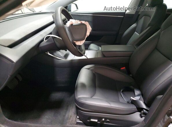 5YJ3E1EB1RF740881 2024 TESLA MODEL Black Front interior view