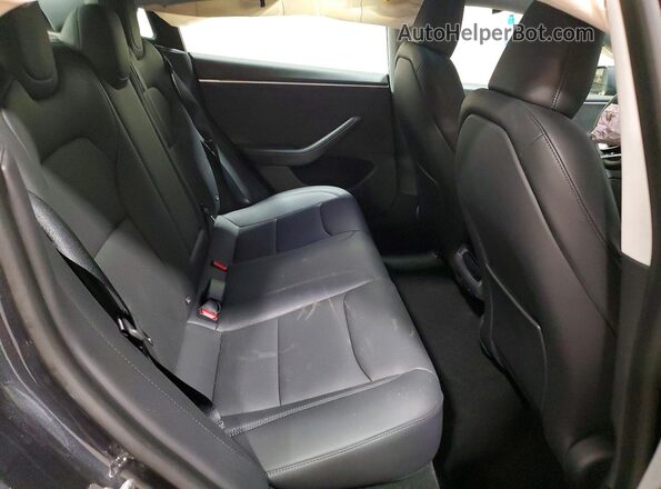 5YJ3E1EB1RF740881 2024 TESLA MODEL Black Rear seats view