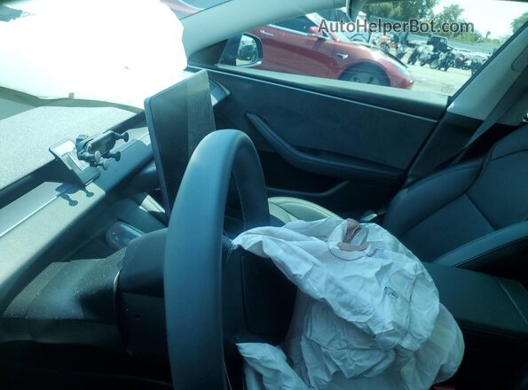 5YJ3E1EB1RF796772 2024 TESLA MODEL Gray Սարքավորումների վահանակի տեսք