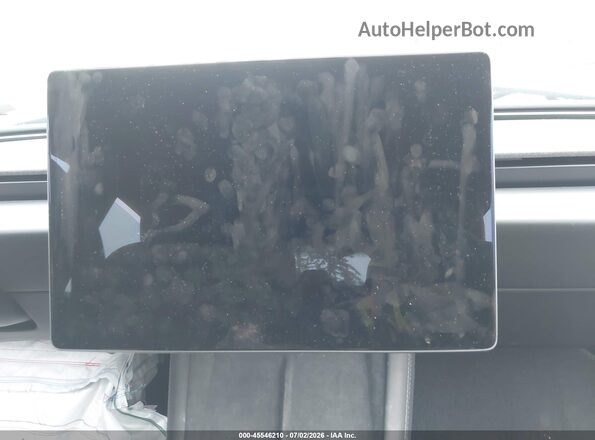 5YJ3E1EB1SF055365 2025 TESLA MODEL 3 Gray Vista de los asientos traseros