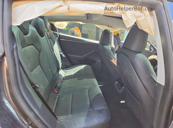 5YJ3E1EB1SF060467 2025 TESLA MODEL Gray Вид задніх сидінь
