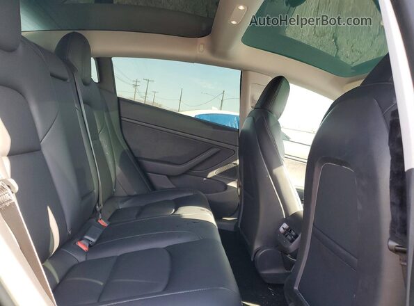 5YJ3E1EB2MF877465 2021 TESLA MODEL White Vista de los asientos traseros