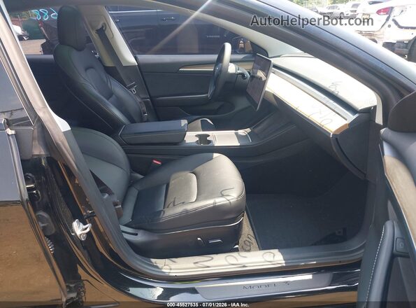 5YJ3E1EB2MF979493 2021 TESLA MODEL 3 Black Front interior view