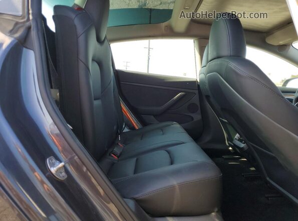5YJ3E1EB2PF678193 2023 TESLA MODEL Black Rear seats view