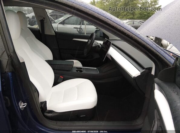 5YJ3E1EB2PF709510 2023 TESLA MODEL 3 Blue Widok wnętrza z przodu