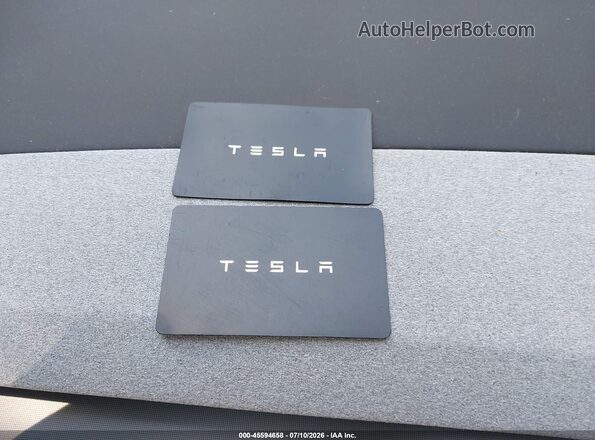 5YJ3E1EB3SF874264 2025 TESLA MODEL 3 Gray Vista trasera