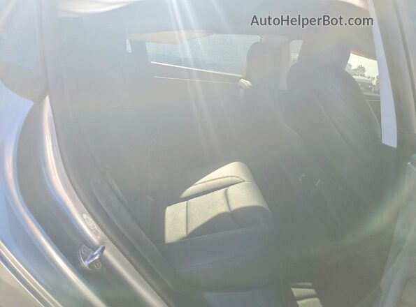 5YJ3E1EB3SF927285 2025 TESLA MODEL Silver Vista de los asientos traseros