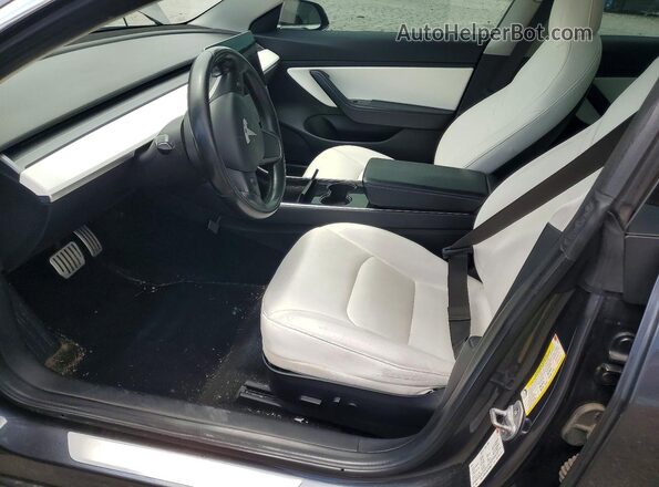 5YJ3E1EB4JF079321 2018 TESLA MODEL Gray Vista interior delantera