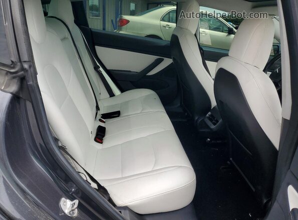 5YJ3E1EB4JF079321 2018 TESLA MODEL Gray Vista de los asientos traseros