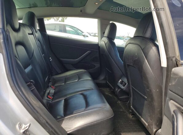 5YJ3E1EB4JF091193 2018 TESLA MODEL Silver Rear seats view