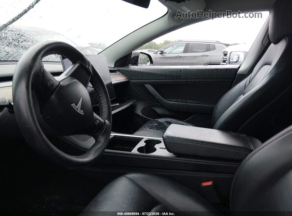 5YJ3E1EB4MF928349 2021 TESLA MODEL 3 Black Front interior view